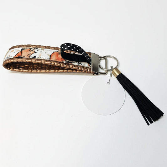 Porte-clé avec sangle en simili cuir