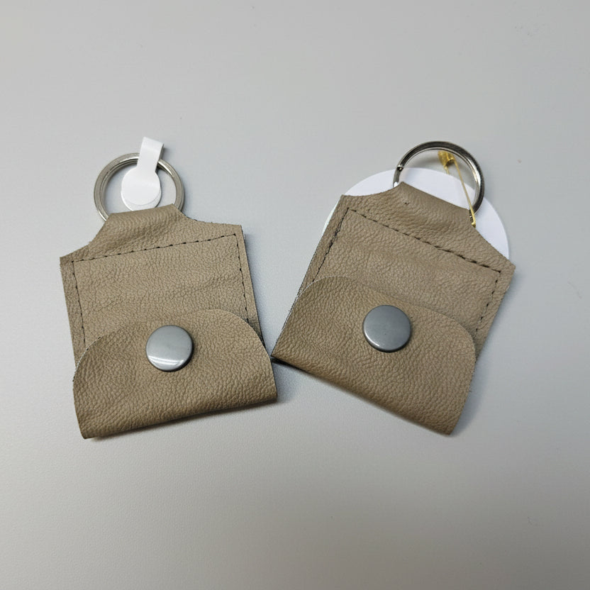 Mini porte-clé avec pochette à bouton pression