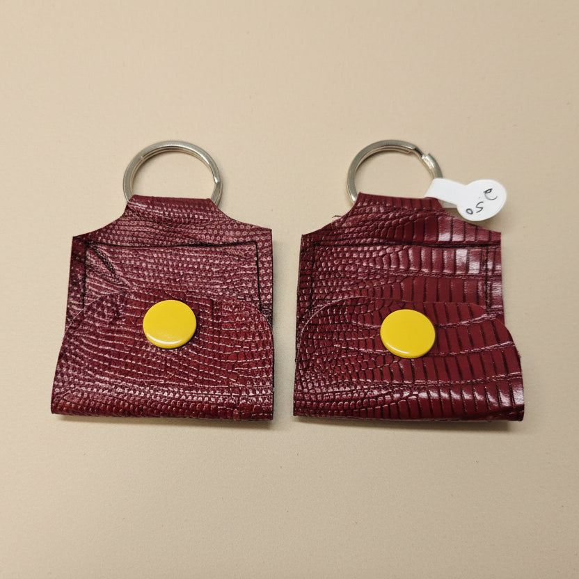 Mini porte-clé avec pochette à bouton pression