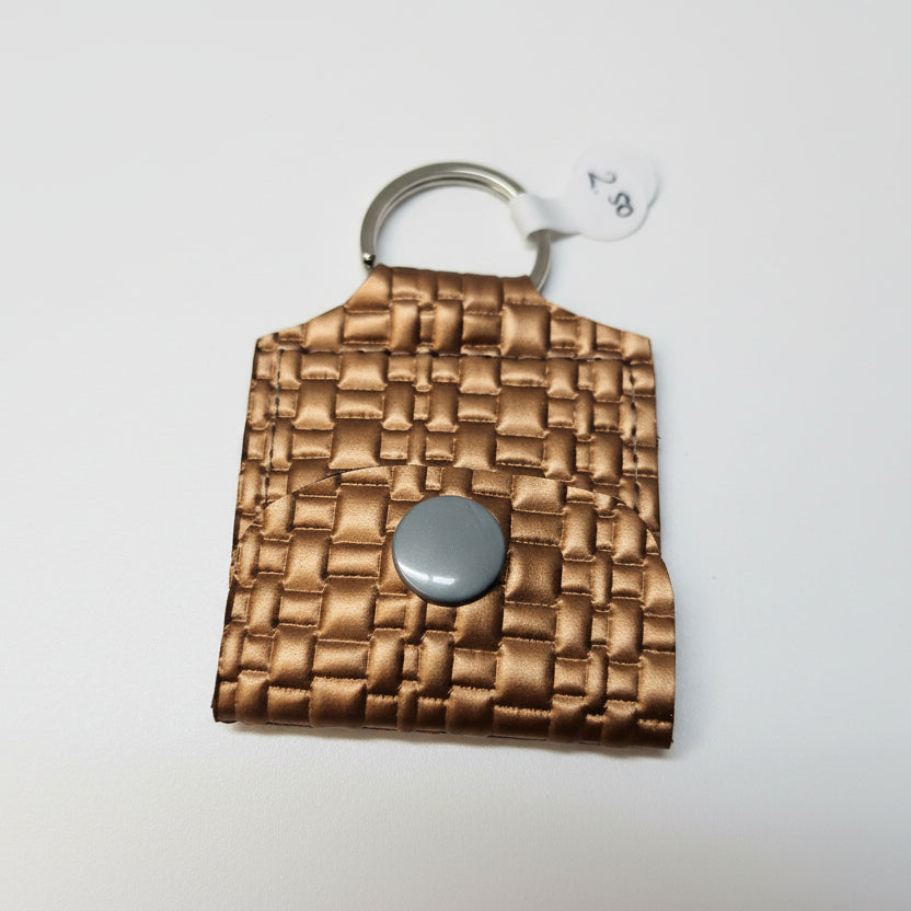 Mini porte-clé avec pochette à bouton pression