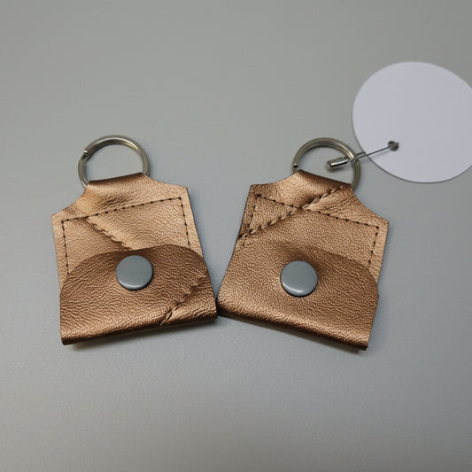 Mini porte-clé avec pochette à bouton pression