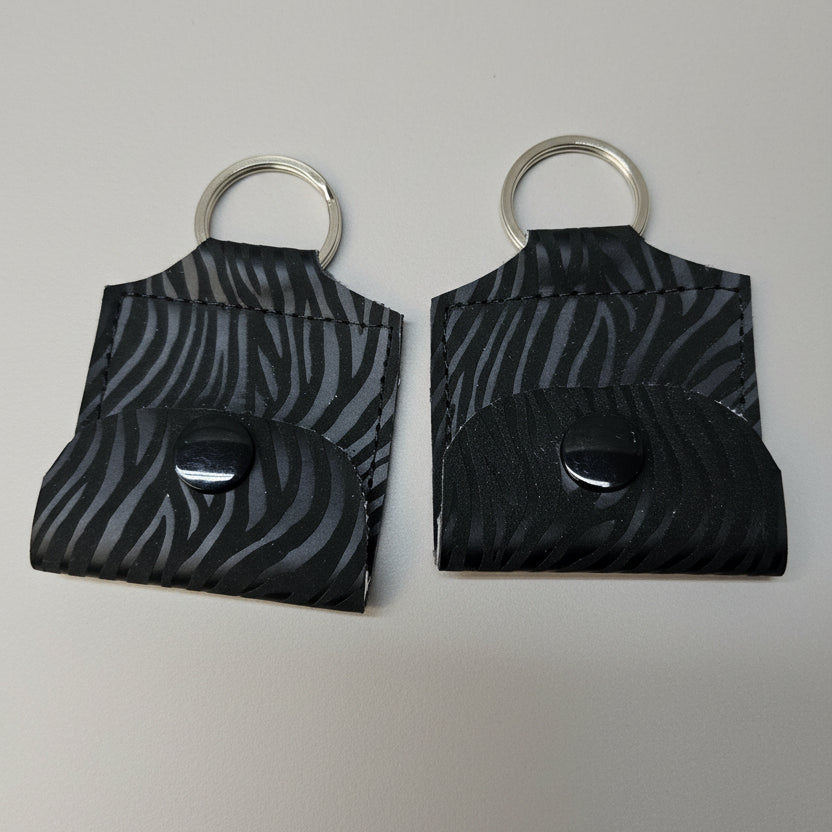 Mini porte-clé avec pochette à bouton pression