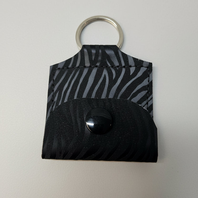 Mini porte-clé avec pochette à bouton pression