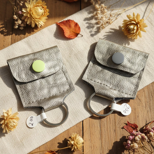 Mini porte-clé avec pochette à bouton pression